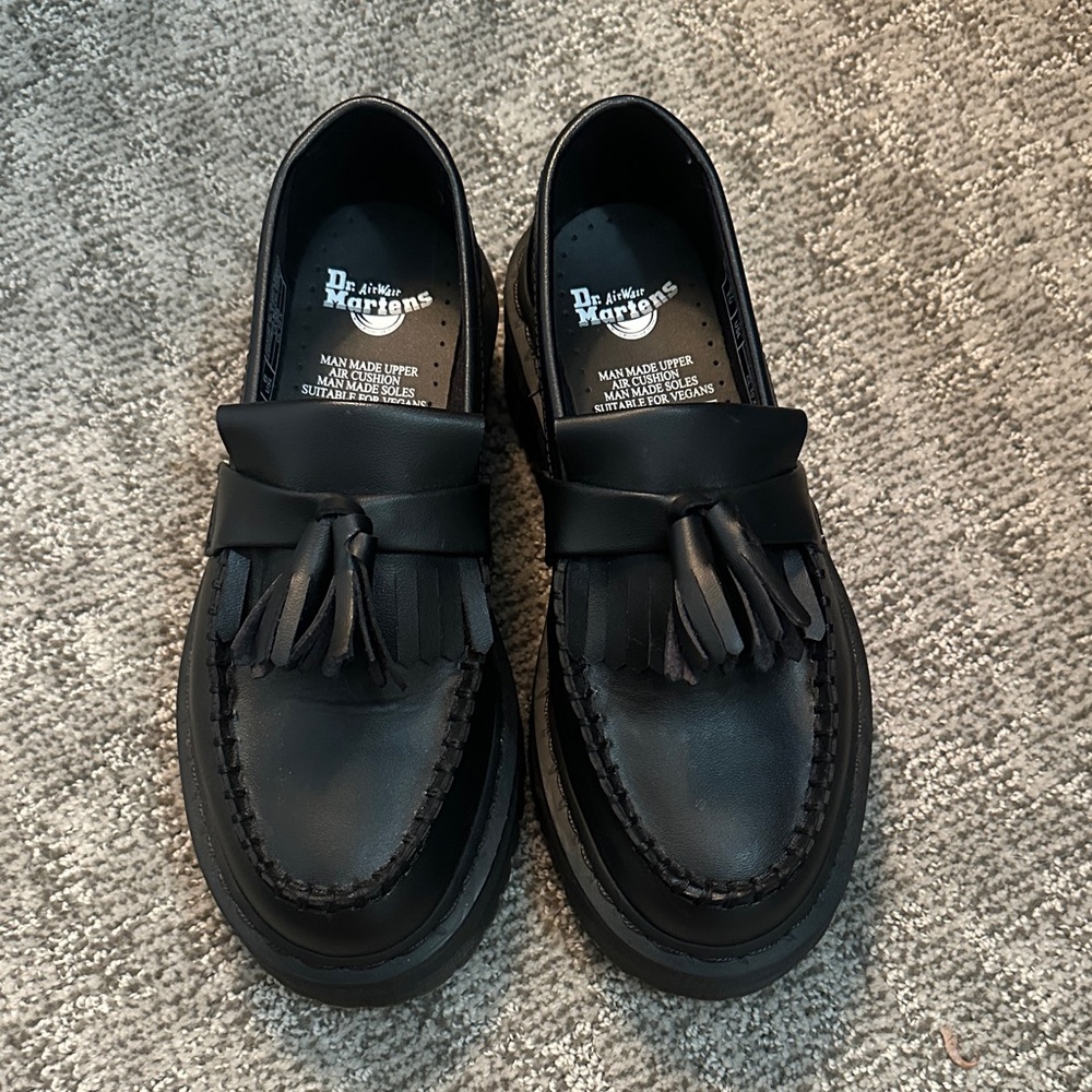 Dr. Martens black platform loafers